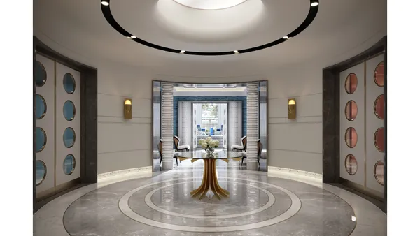 a living room with furniture and a lamp