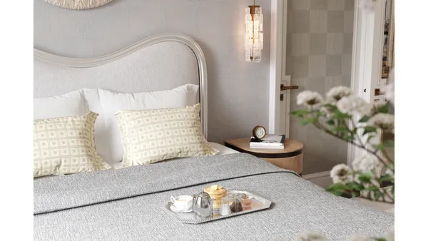 a en suite bathroom with a sink and a mirror