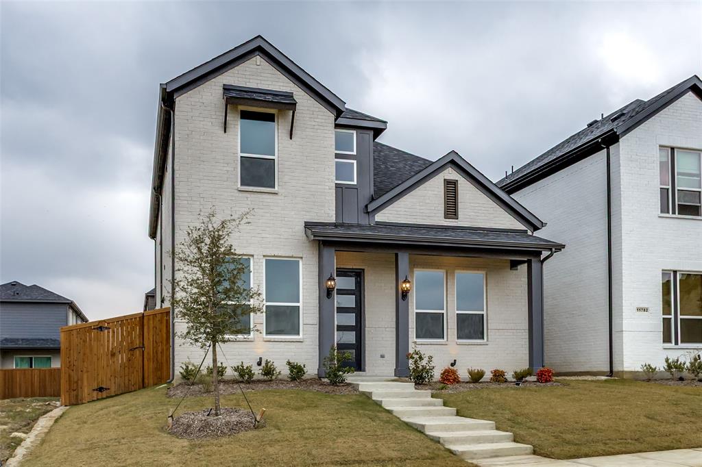 11764 Chartwell Court Frisco, TX 75035 - Photo 2 of 25 a front view of a house with garden