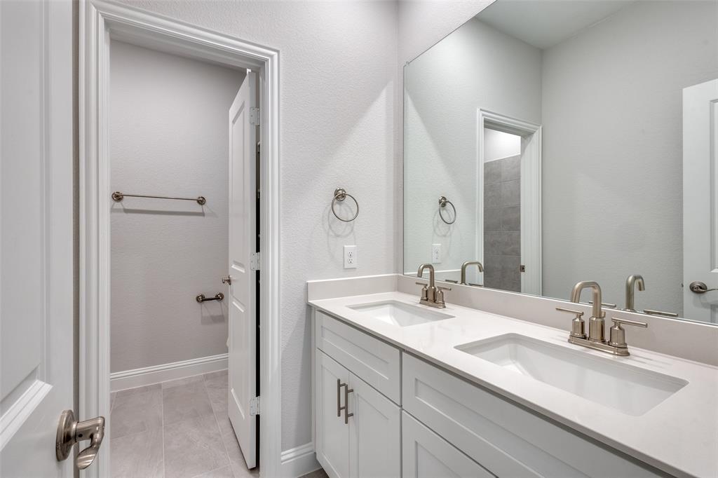 11764 Chartwell Court Frisco, TX 75035 - Photo 21 of 25 a bathroom with a double vanity sink mirror and