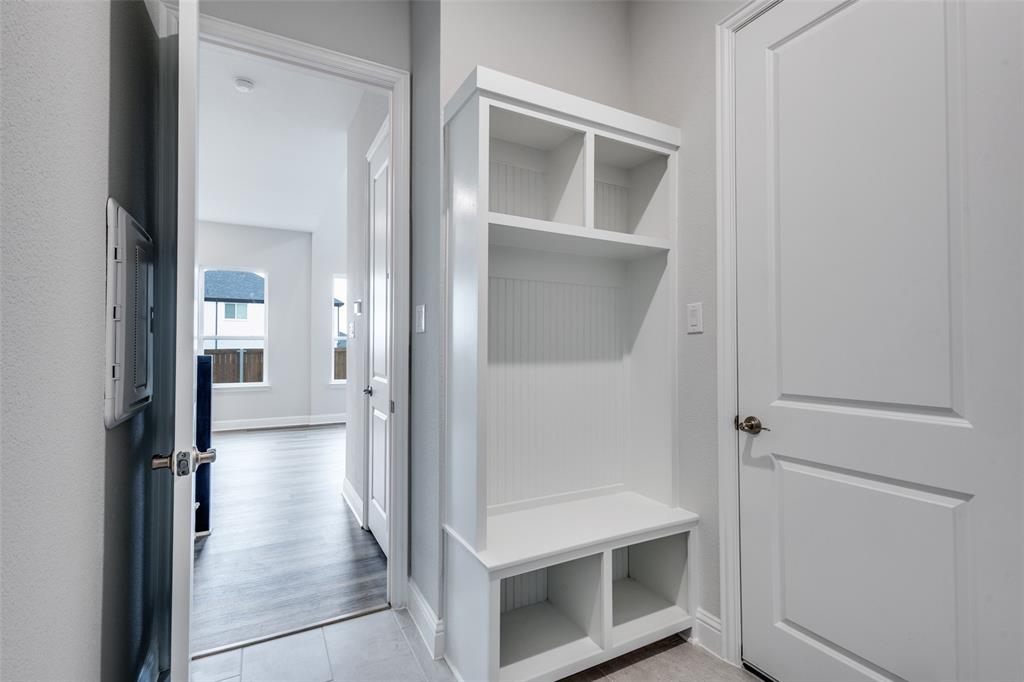 11764 Chartwell Court Frisco, TX 75035 - Photo 23 of 25 a view of entryway and kitchen