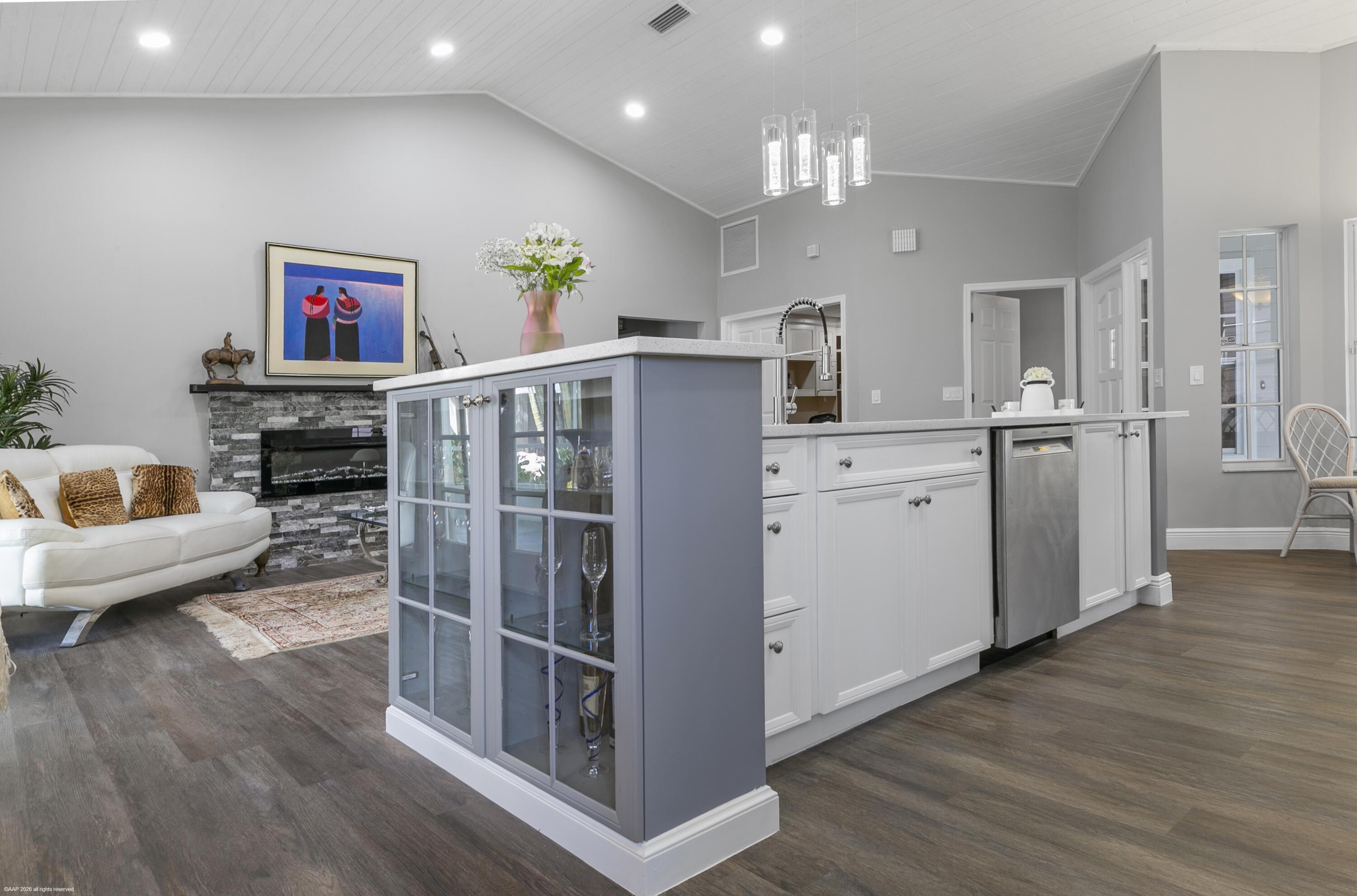 12635 Timber Ridge Circle Wellington, FL 33414 - Photo 11 of 33 a view of kitchen with stainless steel appliances cabinets and wooden floor