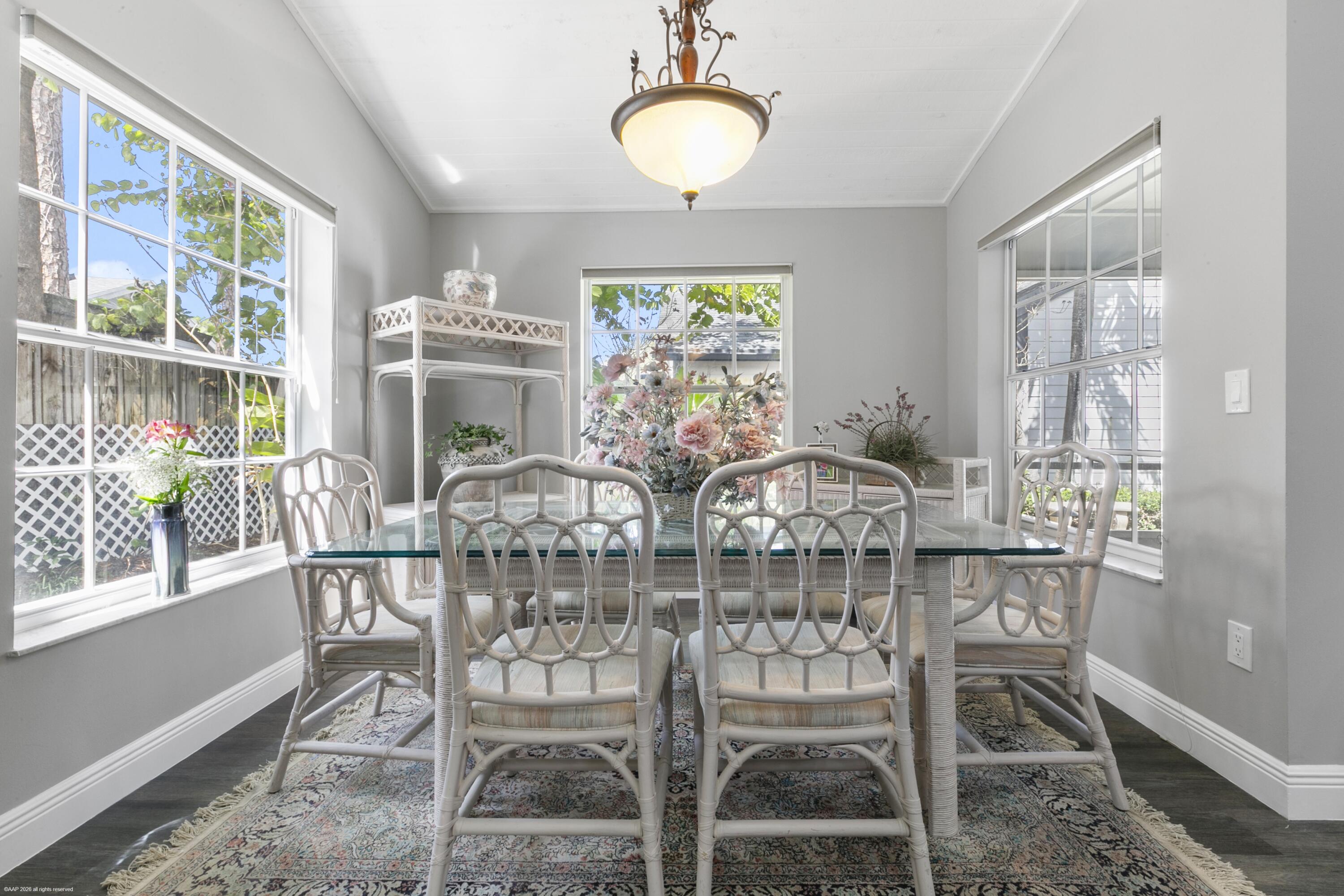 12635 Timber Ridge Circle Wellington, FL 33414 - Photo 14 of 33 a view of a dining room with furniture wooden floor and chandelier