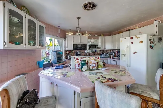 a room with furniture and a chandelier