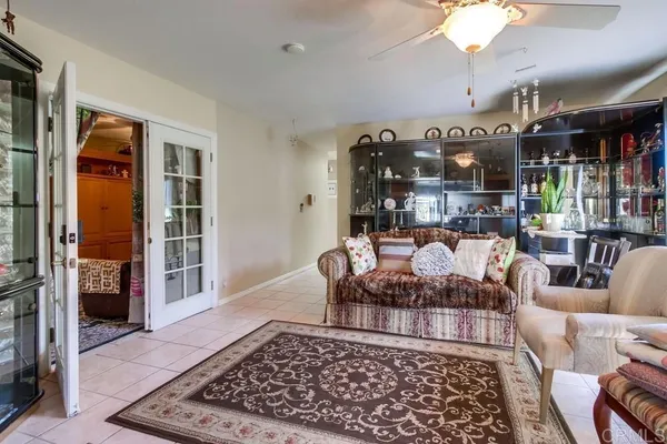 a living room with furniture and a rug