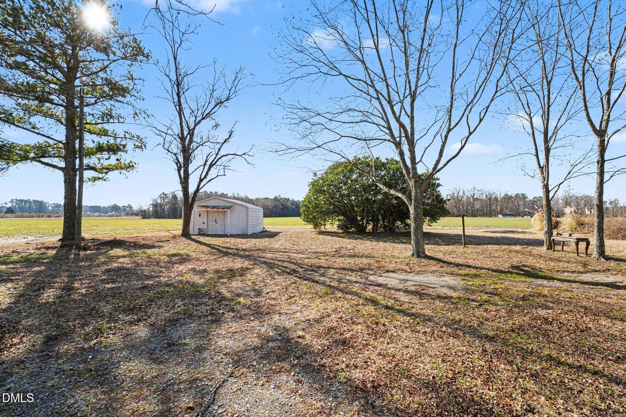 3038 Brogden Road Smithfield, NC 27577 - Photo 10 of 40 side yard with barn