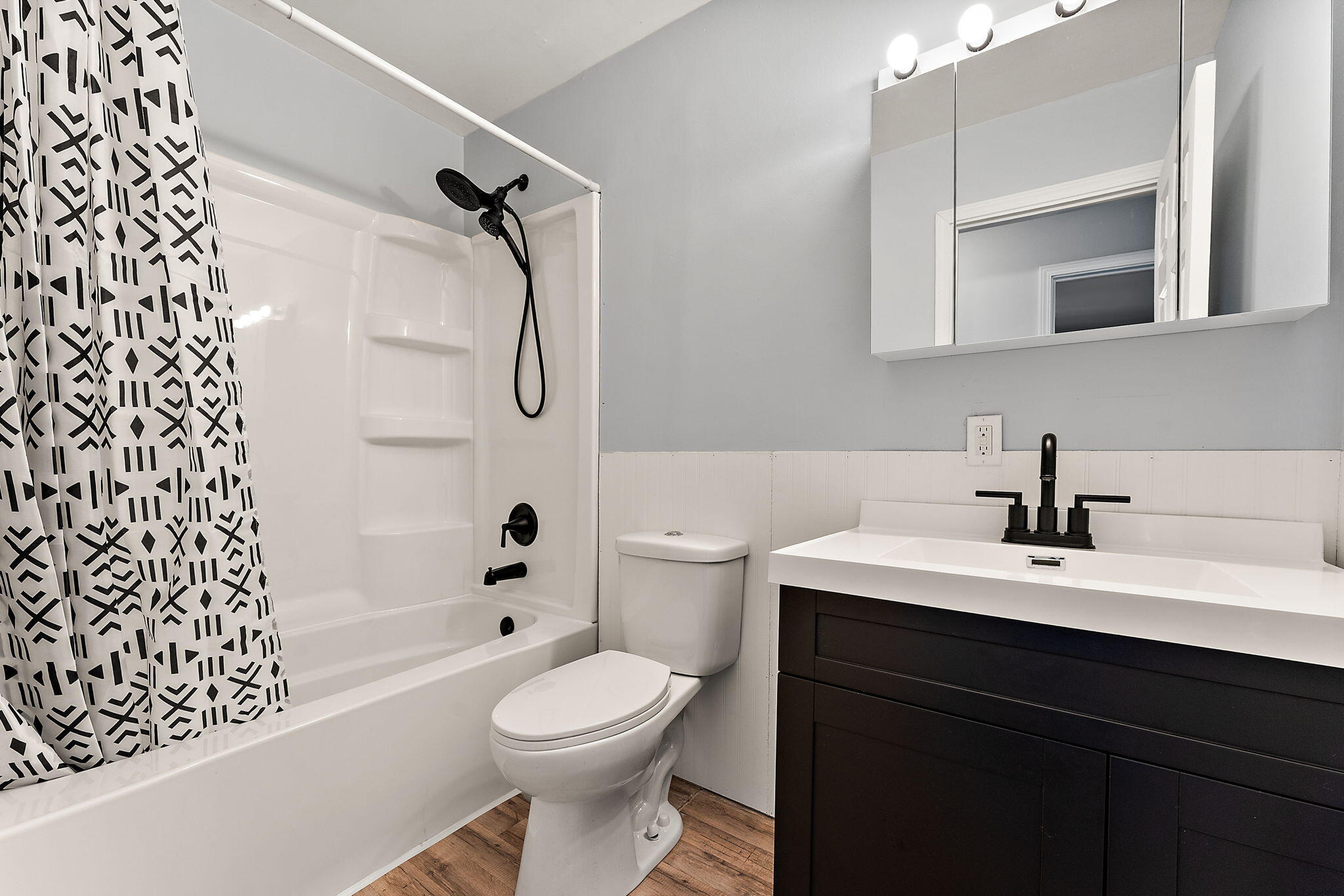 739 Eagle Creek Road Valparaiso, IN 46385 - Photo 6 of 23 a bathroom with a sink a toilet and shower