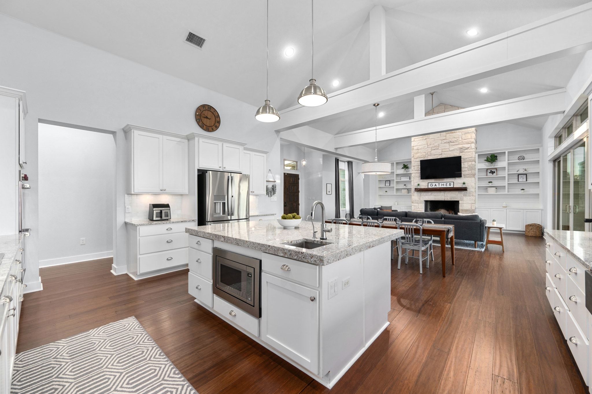 1821 Overland Stage Road Dripping Springs, TX 78620 - Photo 16 of 39 a kitchen with a sink stove and cabinets