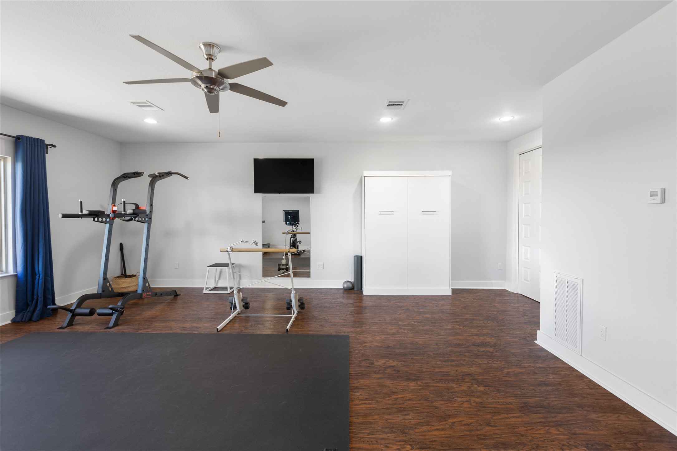1821 Overland Stage Road Dripping Springs, TX 78620 - Photo 30 of 39 a view of a livingroom with a flat screen tv