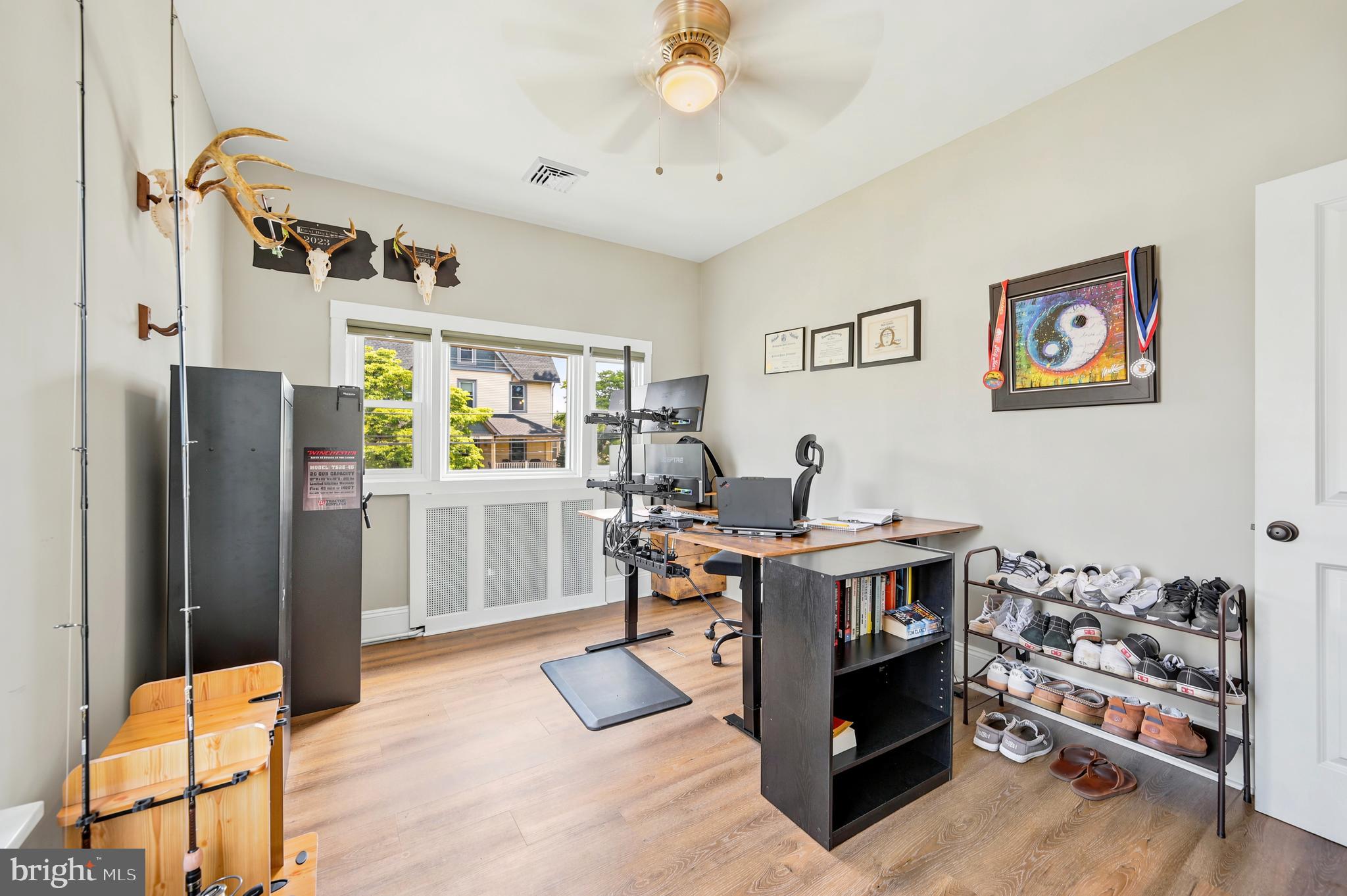 211 North Sylvania Avenue Jenkintown, PA 19046 - Photo 10 of 17 a view of a kitchen with fridge and workspace