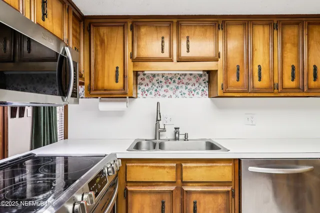 a view of an entryway with a chandelier