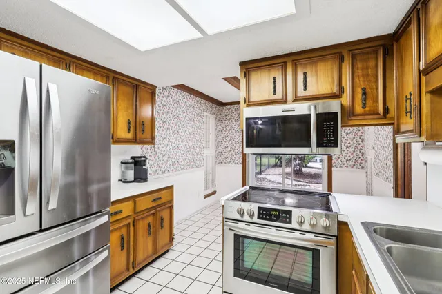 a view of a backyard of the house