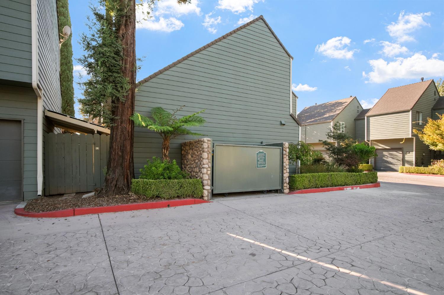 8667 Mariners Drive, Unit 53 Stockton, CA 95219 - Photo 20 of 24 a view of a house with porch and garden