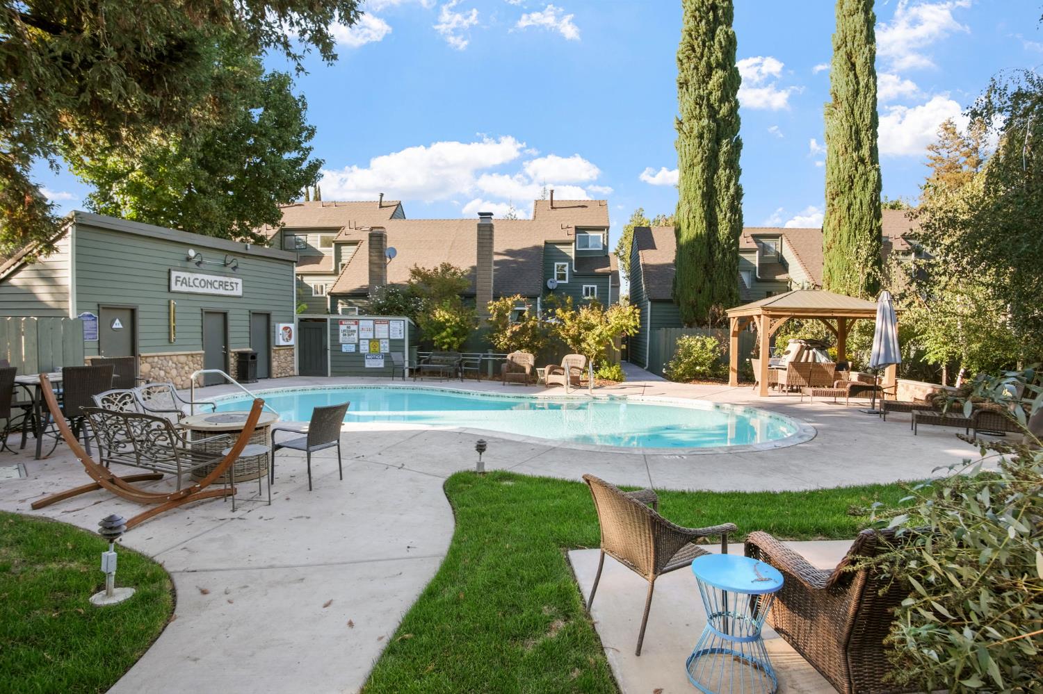 8667 Mariners Drive, Unit 53 Stockton, CA 95219 - Photo 24 of 24 a view of a patio with couches and table and chairs and potted plants