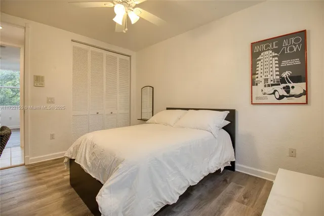 a view of a chairs and table on the wooden deck