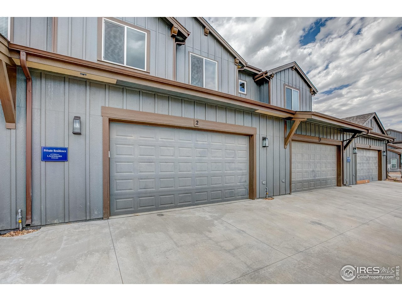 6227 Vernazza Way, Unit 2 Windsor, CO 80550 - Photo 24 of 35 a view of garage