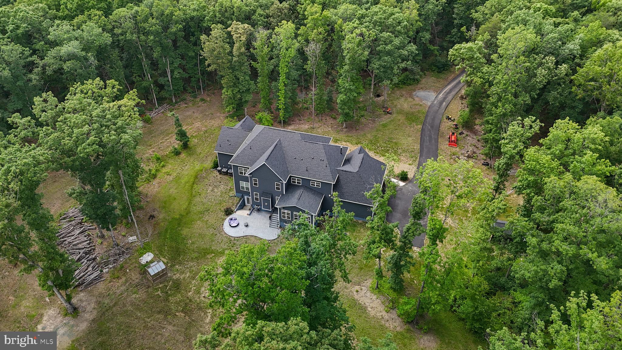 80 Shackelford Well Road Fredericksburg, VA 22406 - Photo 86 of 108 an aerial view of a house with outdoor space and trees all around