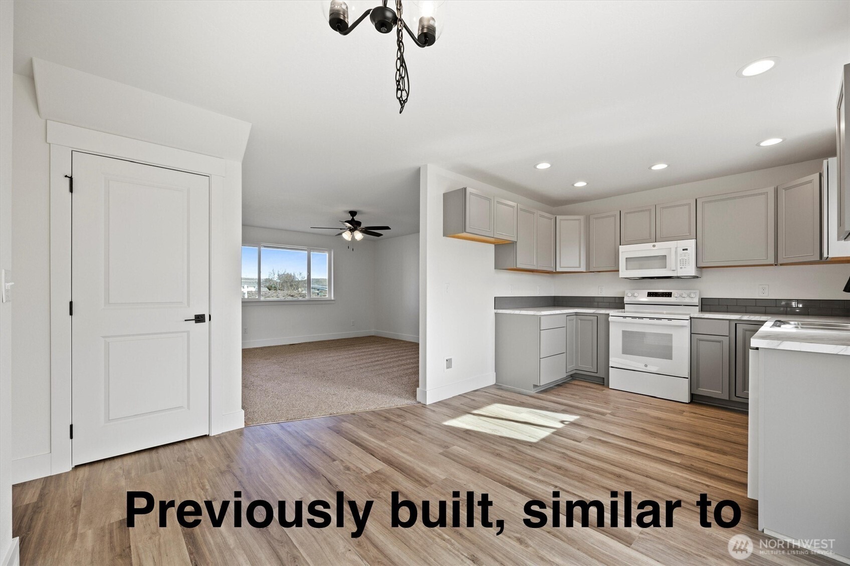 108 North Ford Street Connell, WA 99326 - Photo 5 of 13 a view of kitchen with wooden floor
