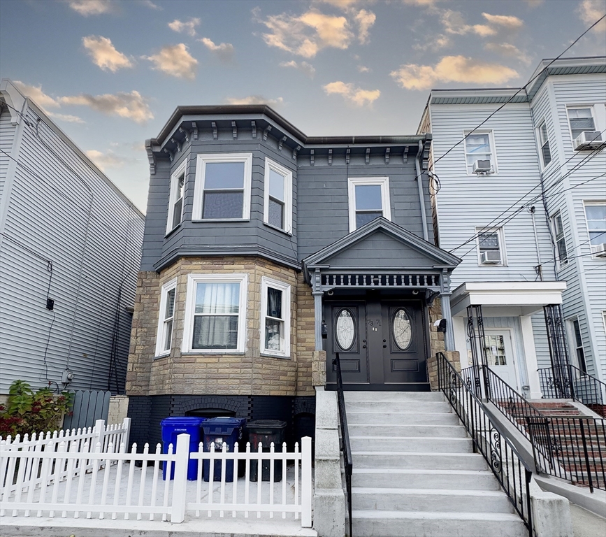 71 West Eagle Street, Unit 2 Boston, MA 02128 - Photo 1 of 31 a front view of a house