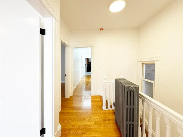 a view of a living room with a door