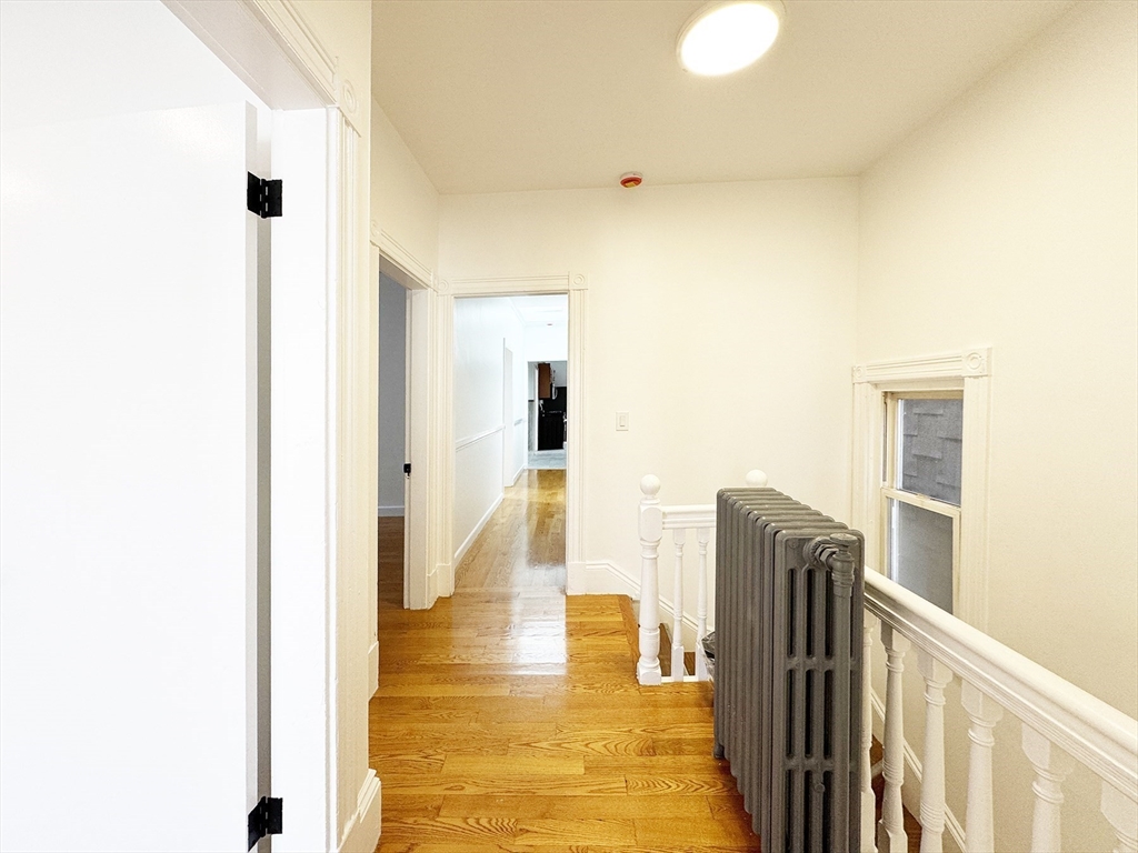 71 West Eagle Street, Unit 2 Boston, MA 02128 - Photo 6 of 31 a view of a living room with a door