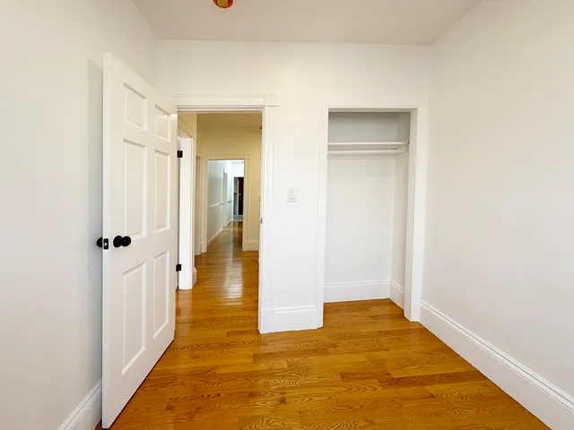 a view of a bathroom with a hallway