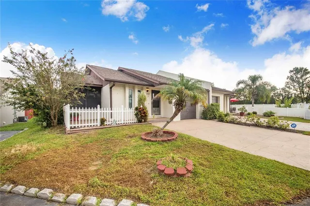 a house view with a garden space
