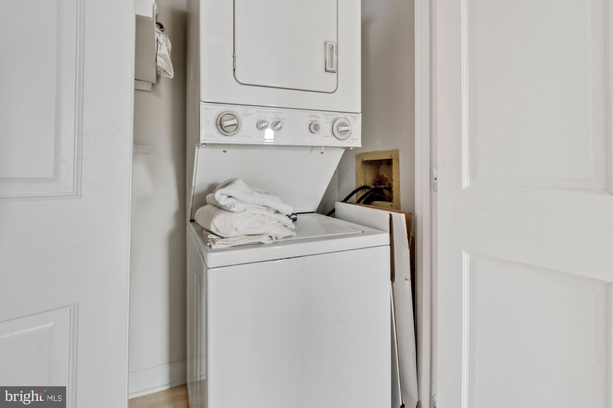1080 Wisconsin Avenue Northwest, Unit 405 Washington, DC 20007 - Photo 26 of 31 a utility room with dryer and washer