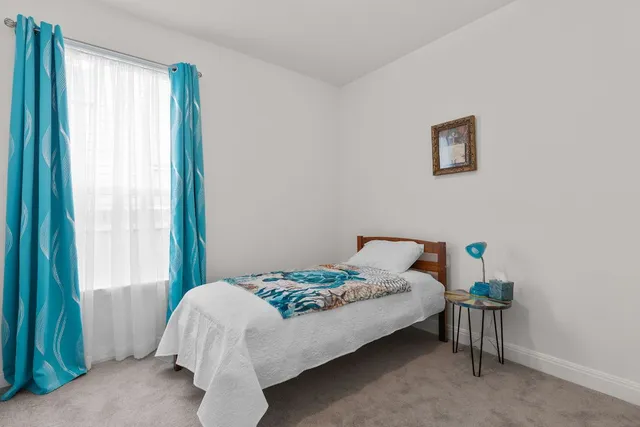a kitchen with stainless steel appliances granite countertop a sink and a stove