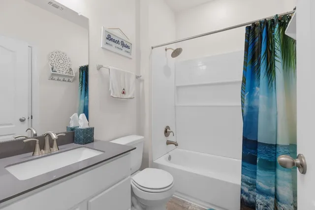 a living room with furniture and closet