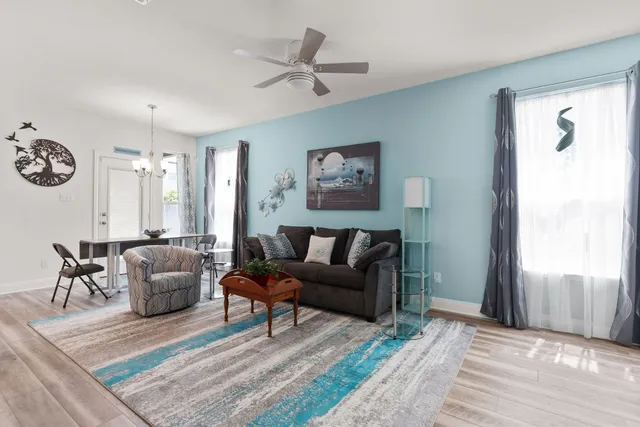 a living room with furniture and a window