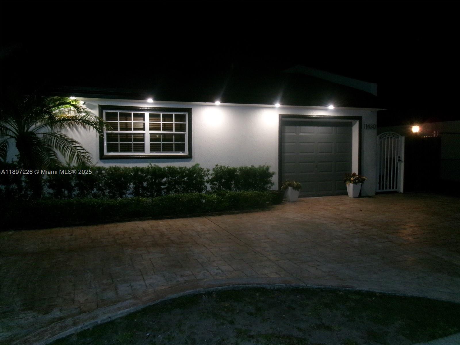 11430 Southwest 83rd Terrace Miami, FL 33173 - Photo 16 of 19 a view of an entryway of a house