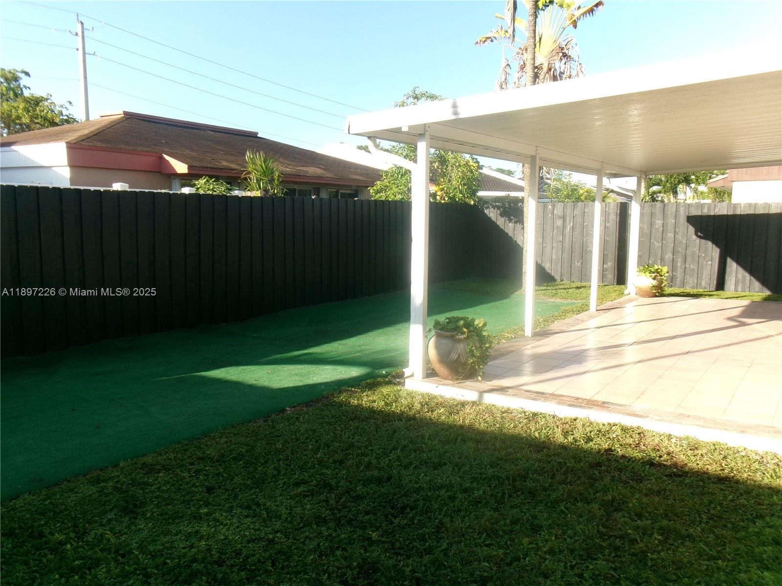 11430 Southwest 83rd Terrace Miami, FL 33173 - Photo 18 of 19 a view of a backyard