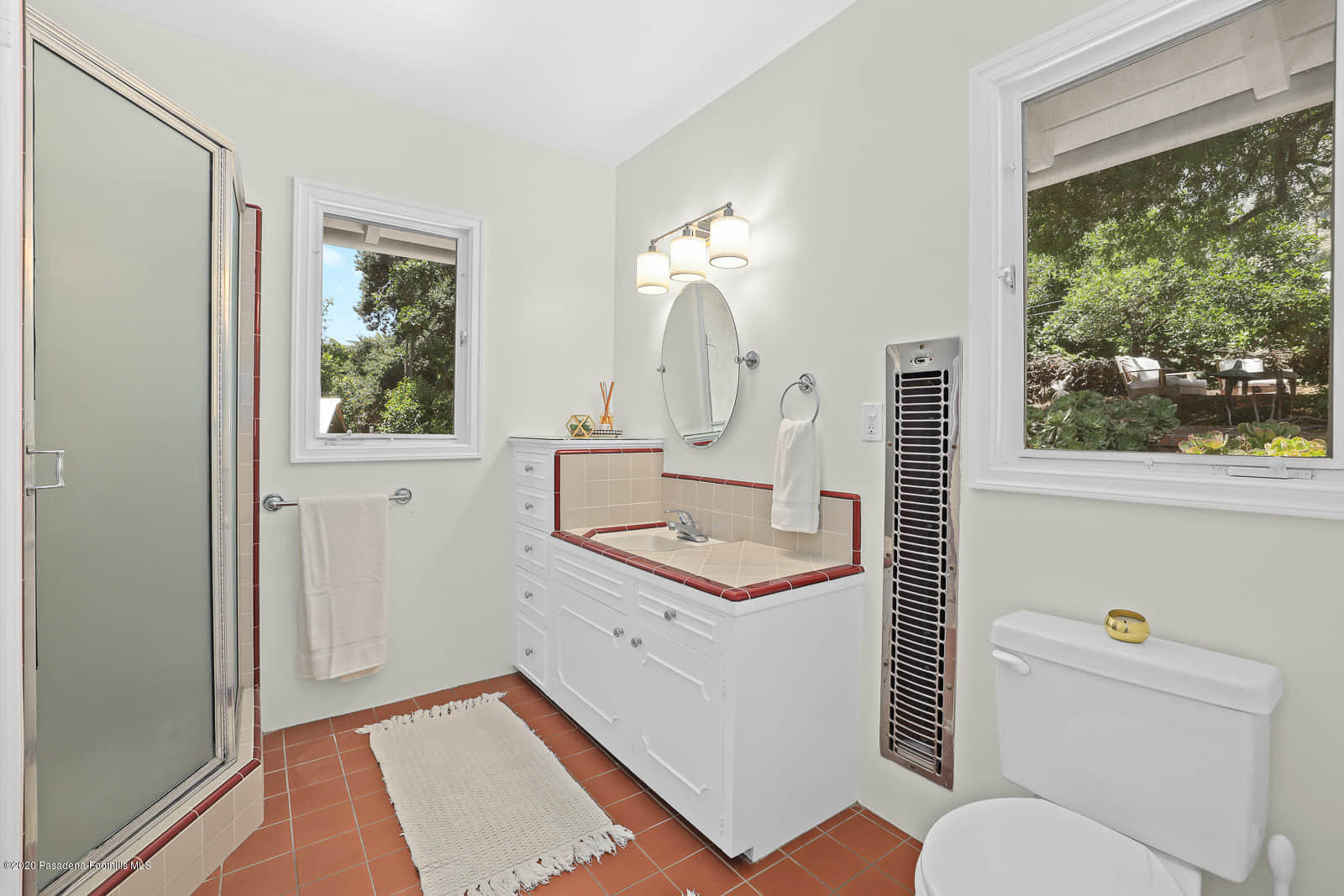 1955 Windover Road Pasadena, CA 91107 - Photo 24 of 71 a bathroom with a sink a toilet and a window