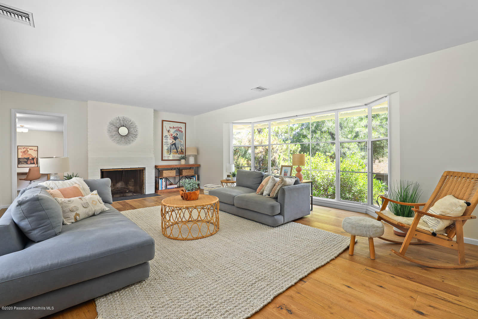 1955 Windover Road Pasadena, CA 91107 - Photo 33 of 71 a living room with fireplace furniture and a large window