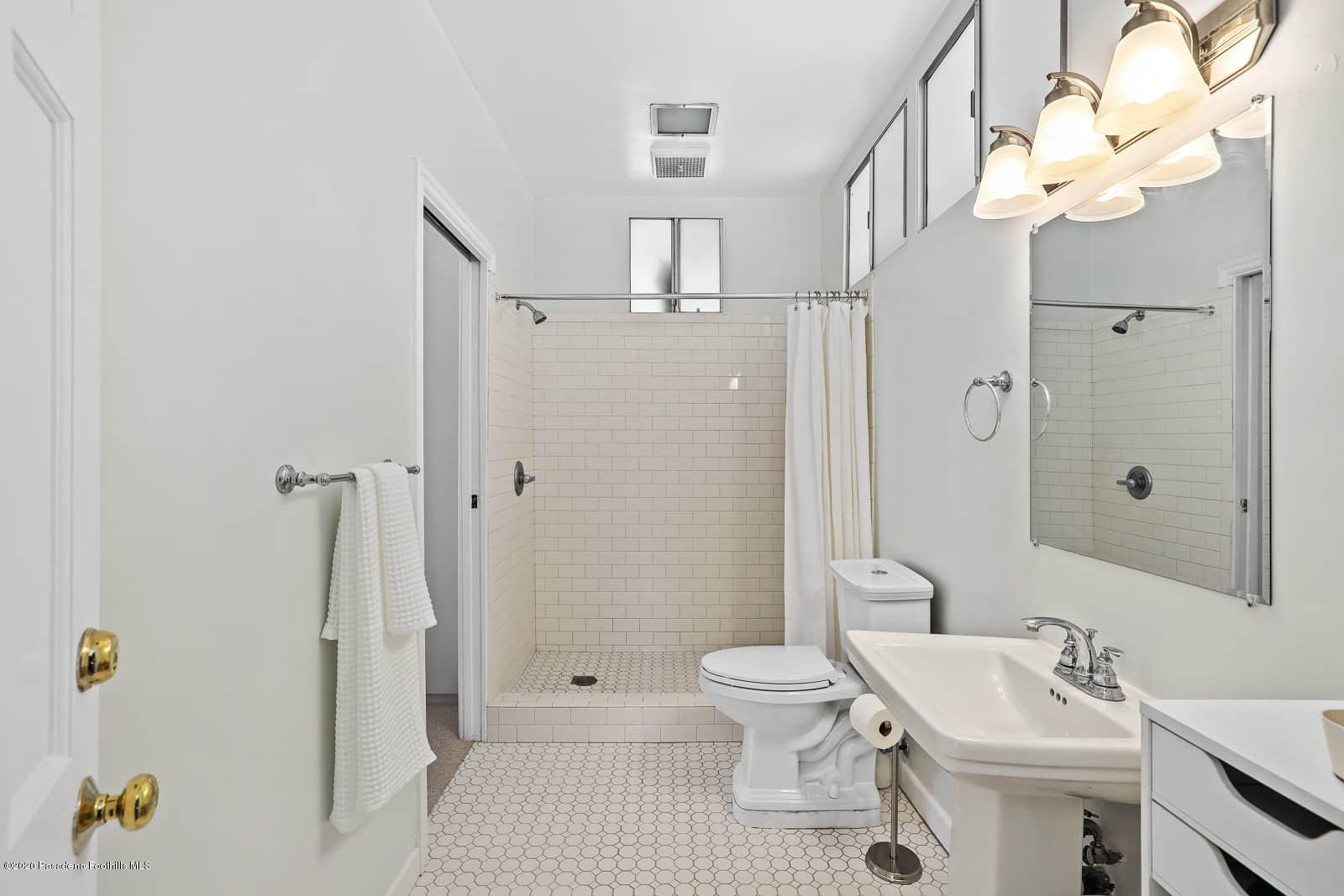 1955 Windover Road Pasadena, CA 91107 - Photo 37 of 71 a bathroom with a sink a toilet and shower