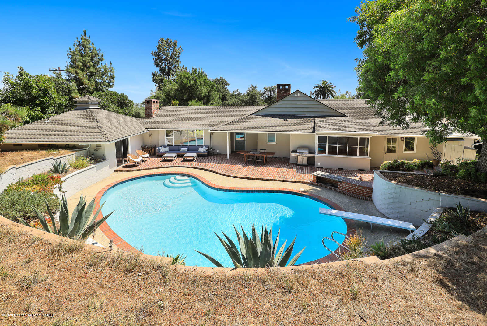1955 Windover Road Pasadena, CA 91107 - Photo 44 of 71 a view of a swimming pool with lounge chairs