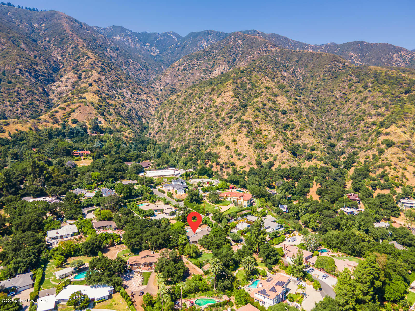 1955 Windover Road Pasadena, CA 91107 - Photo 70 of 71 a view of a lush green hillside and a building