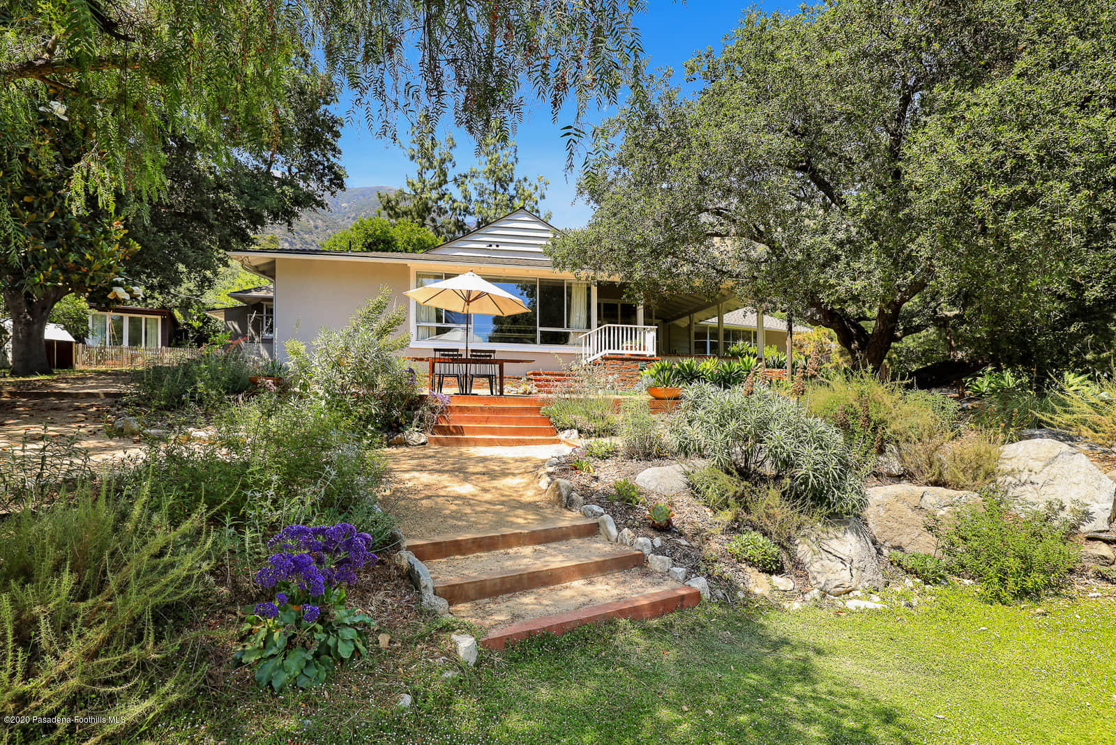 1955 Windover Road Pasadena, CA 91107 - Photo 8 of 71 a view of a house with a yard and garden