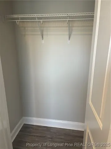 a view of a room with racks on the wall