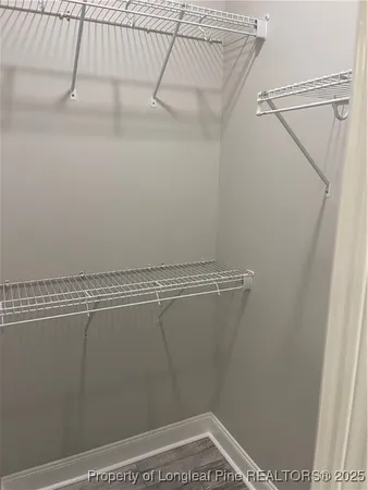 a view of a room with racks on the wall