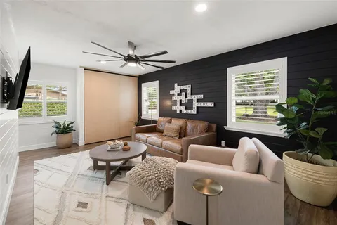 a bedroom with a bed and a walk in closet