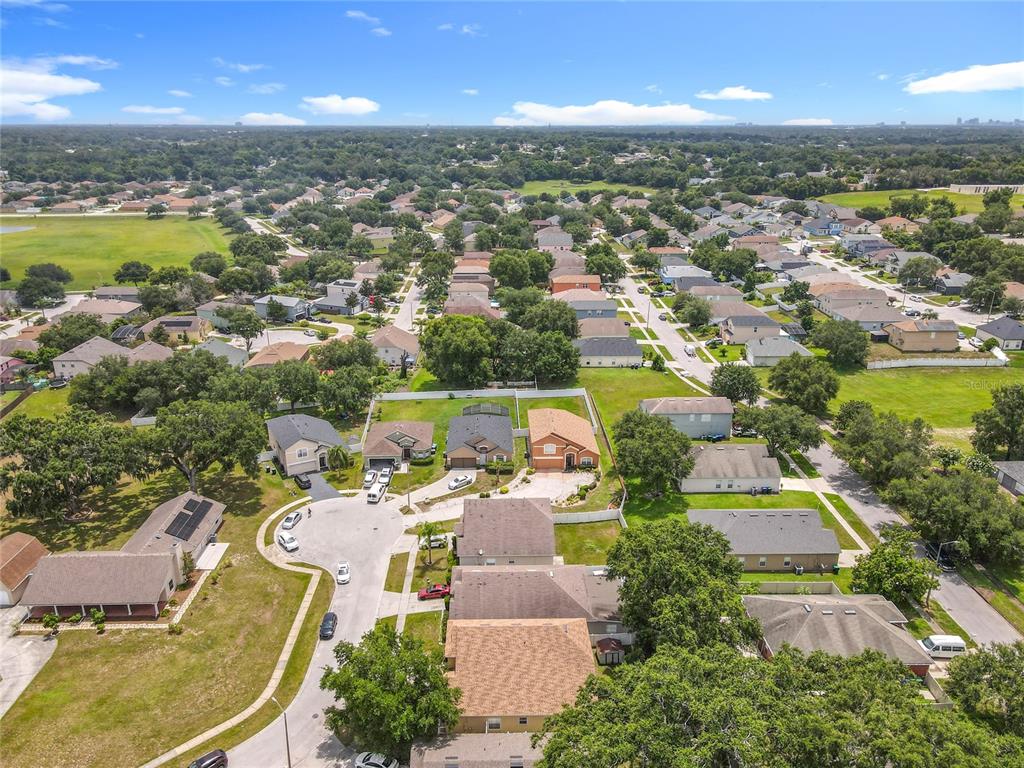 7939 Riffle Lane Orlando, FL 32818 - Photo 50 of 52 an aerial view of residential houses with outdoor space and lake view