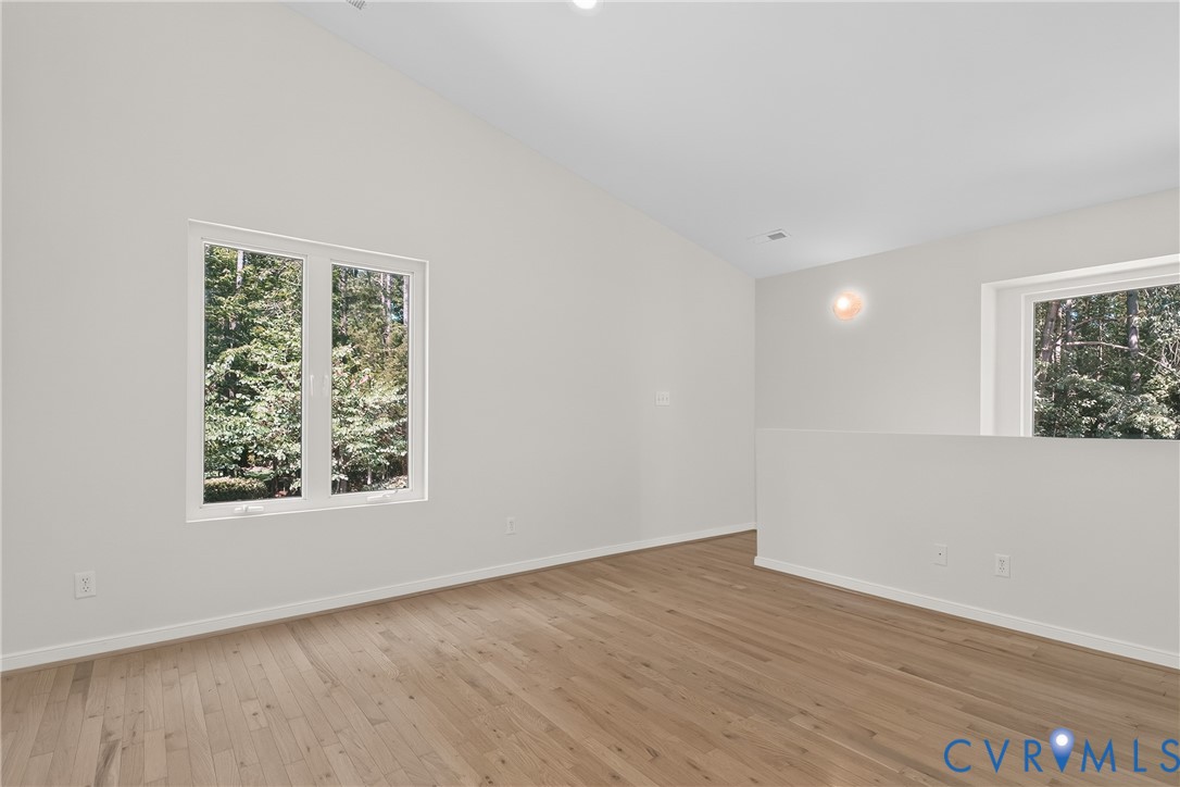 17089 Goshen Road Montpelier, VA 23192 - Photo 27 of 64 Wood-finish flooring, vaulted ceiling, large windo