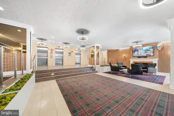 a view of a living room and a couch