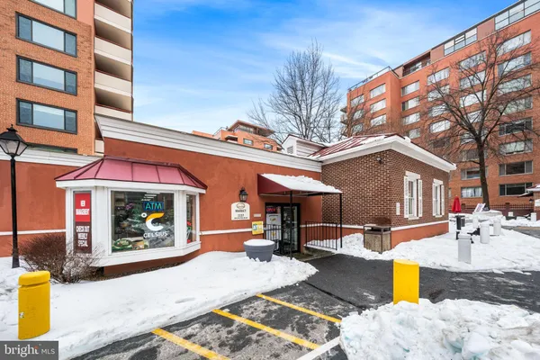 a front view of a building with street view