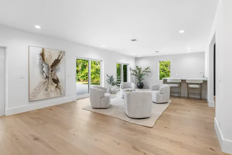 a view of a living room and window