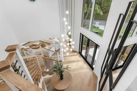 a spacious bedroom with a bed and window