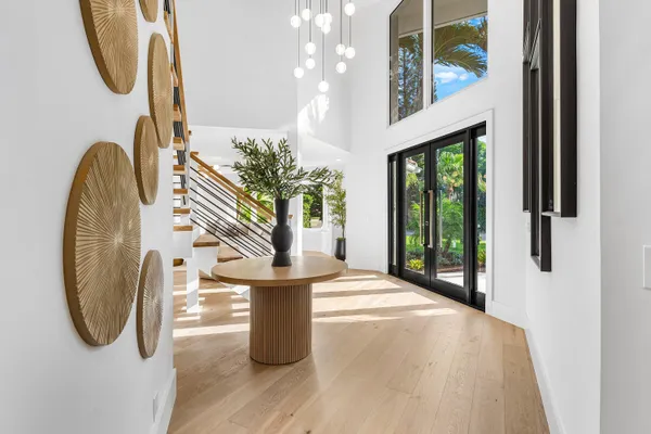 a view of a entryway with wooden floor