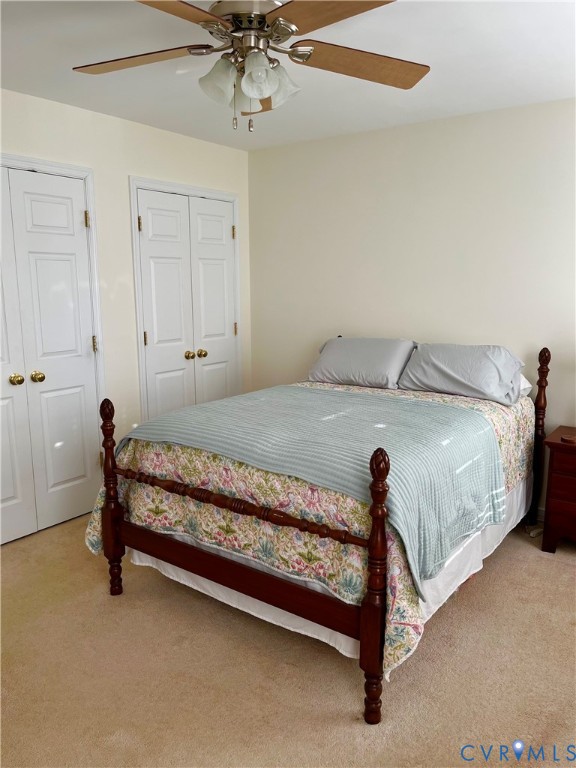 3420 Osborne Road Chester, VA 23831 - Photo 22 of 36 a bed sitting in a bedroom next to a window